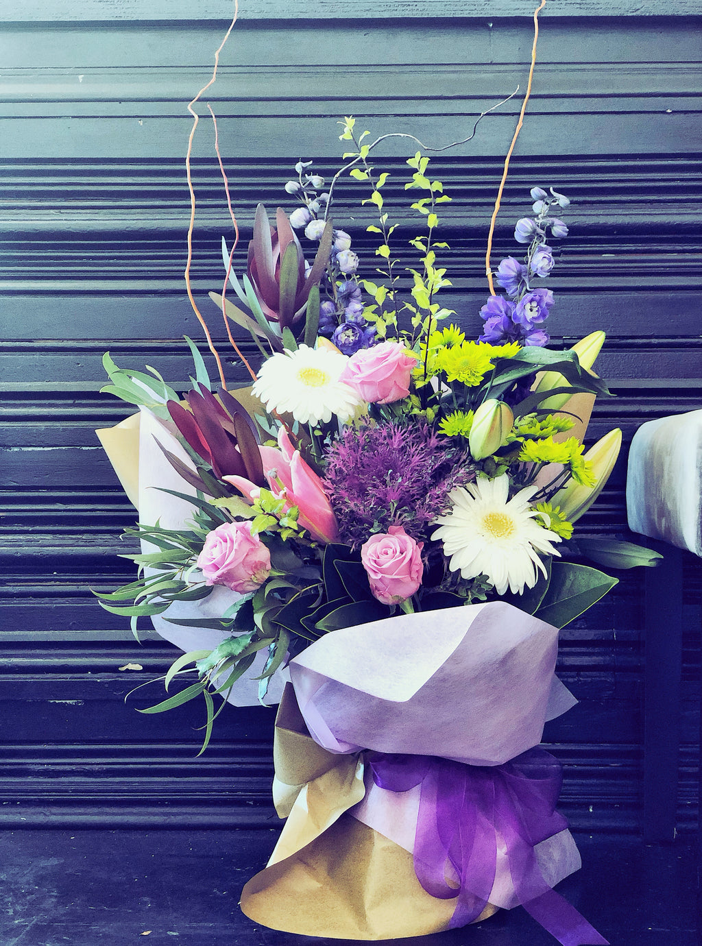 Purple Fresh Flowers Arrangement in a box container