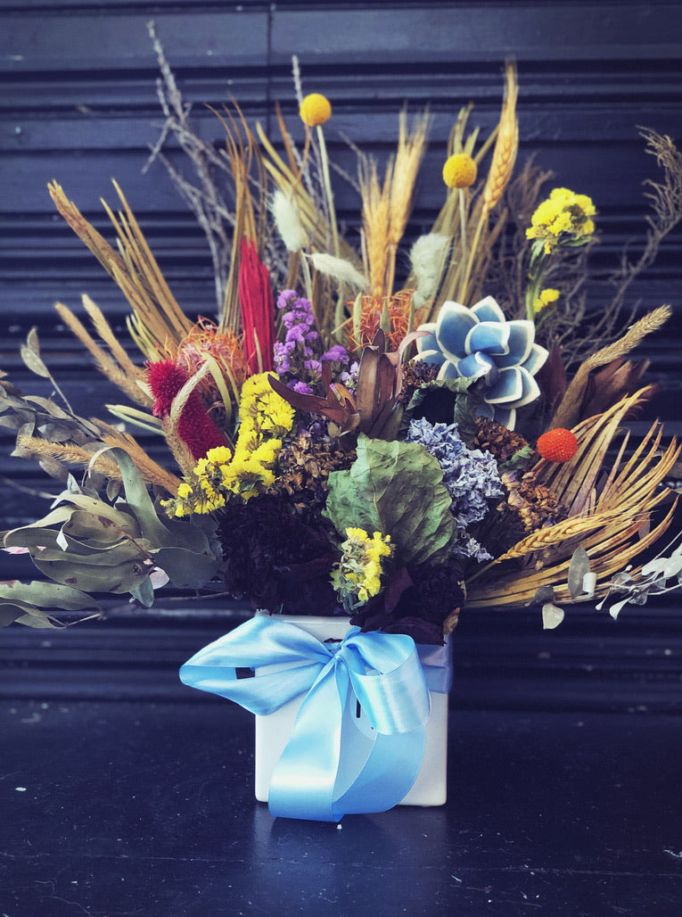 dried flower arrangement blue and bright
