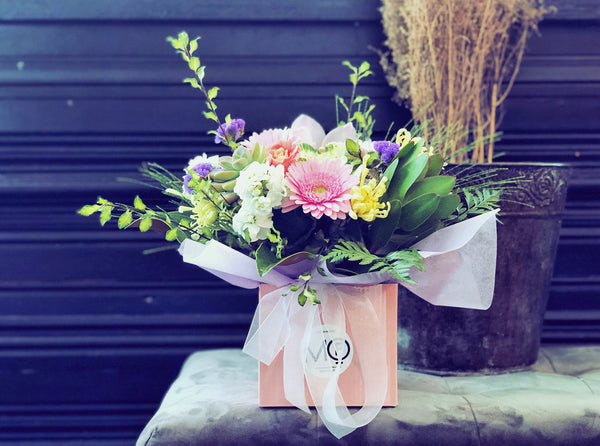 Pink Fresh Flowers Arrangement in Container