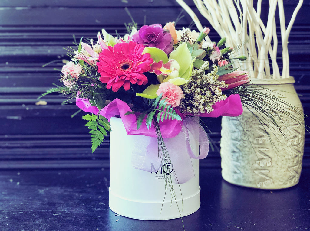 Fresh Flowers Arrangement in Container Pink