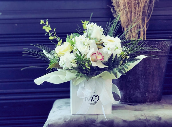 White and Green Fresh Flowers Arrangement in Container